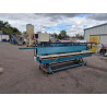 Double tilt table with conveyor