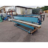 Double tilt table with conveyor