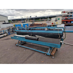 Double tilt table with conveyor